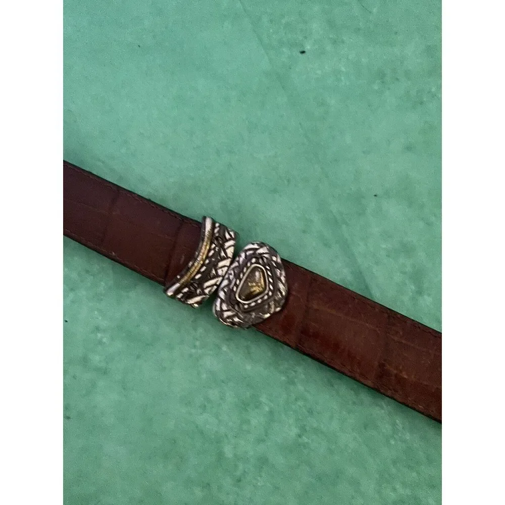 Ladies leather reversible belt black and brown with embellishments. Size med/30.
